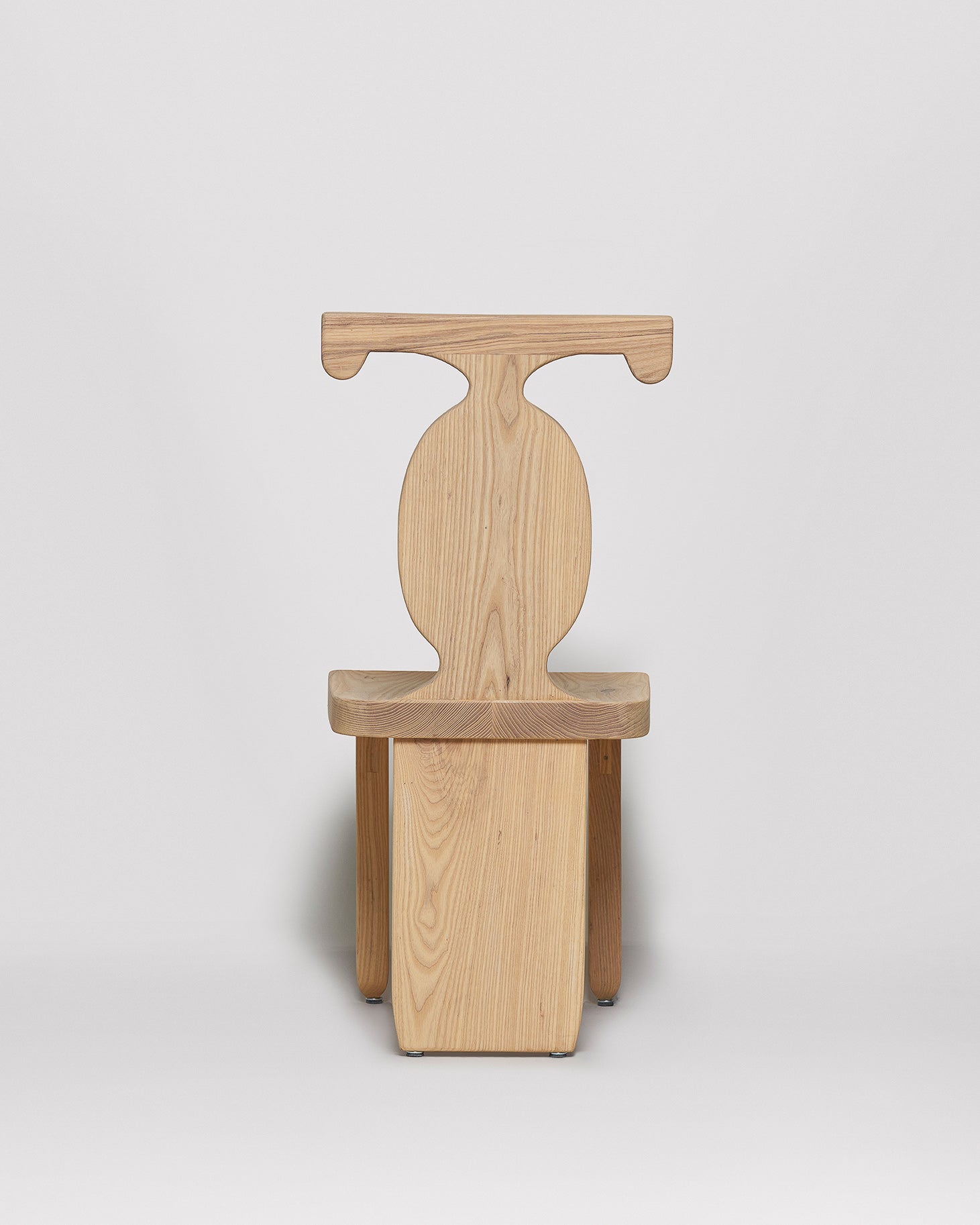 Sculptural African wooden chair in natural Ash