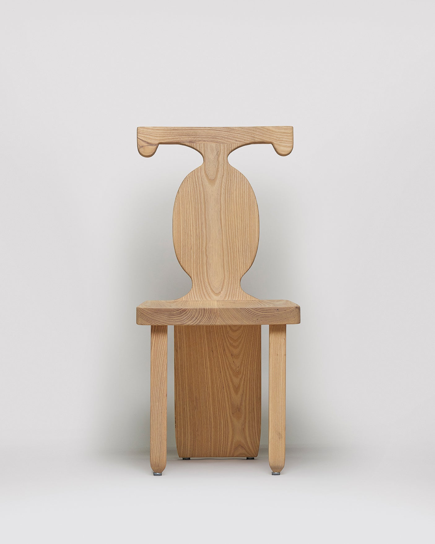 Sculptural African wooden chair in natural Ash