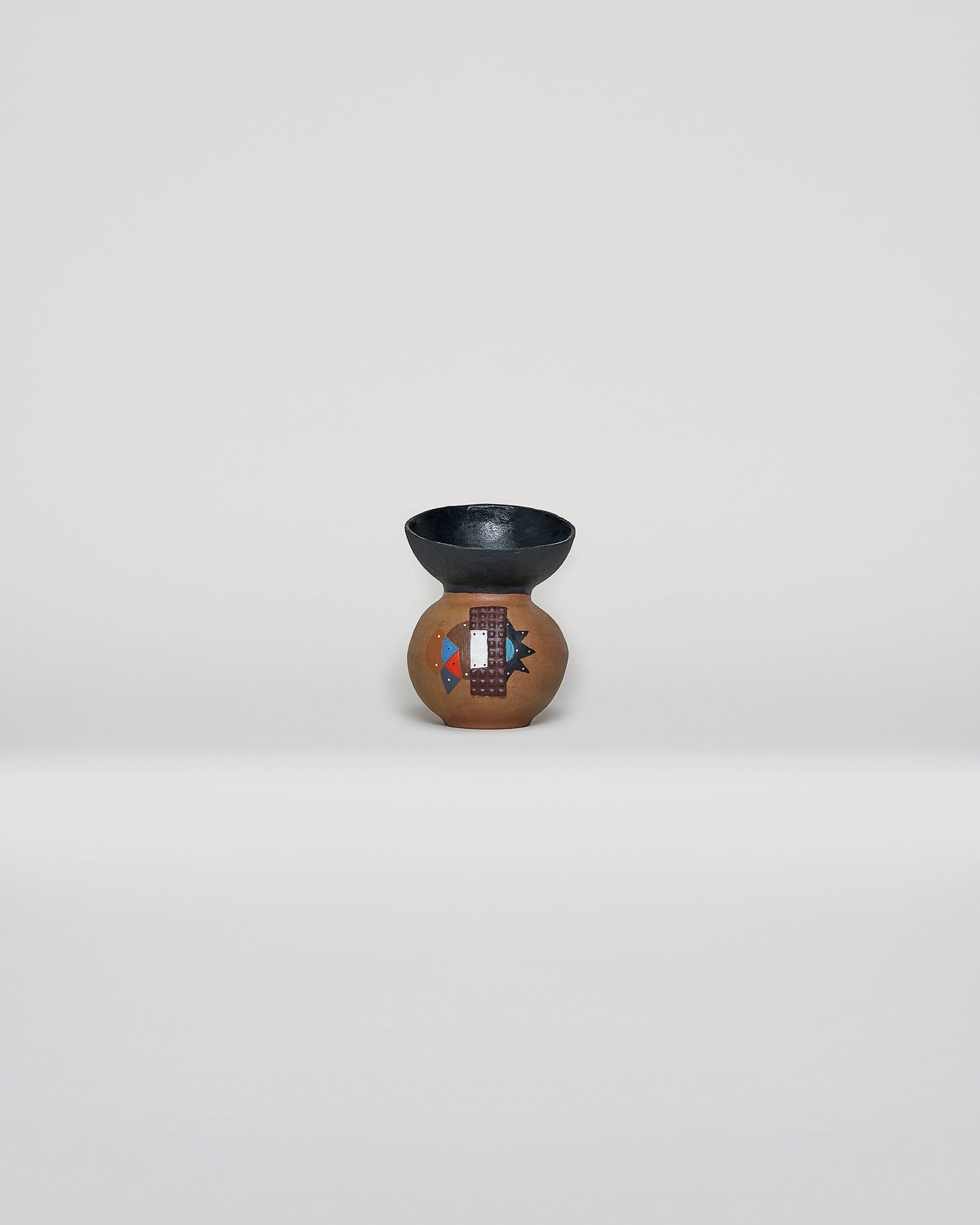 ceramic vase with tribal pattern glaze
